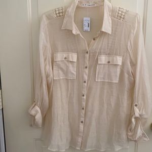 Woman’s button down blouse. New with tags.
